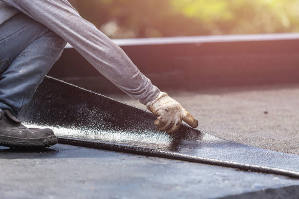 Professional Basement Waterproofing technician working in Pikesville, MD